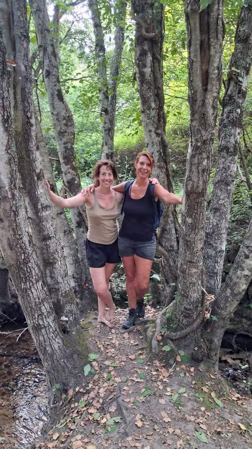 Ellen and Saskia on a woodland path